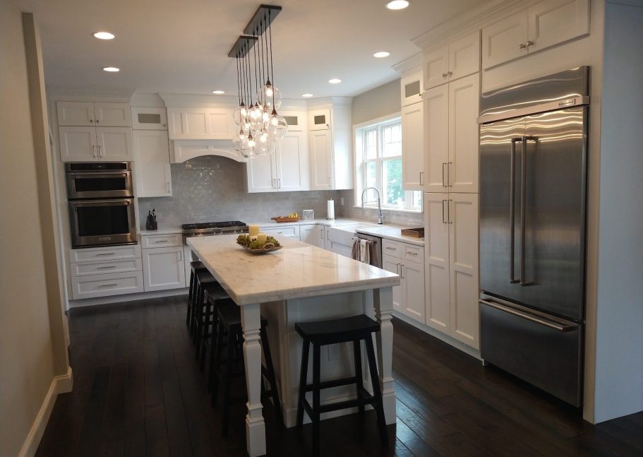 Bathroom remodeling in Horsham pa Modern bathroom featuring a freestanding bathtub, triple showerheads, accent lighting and marble finishes.